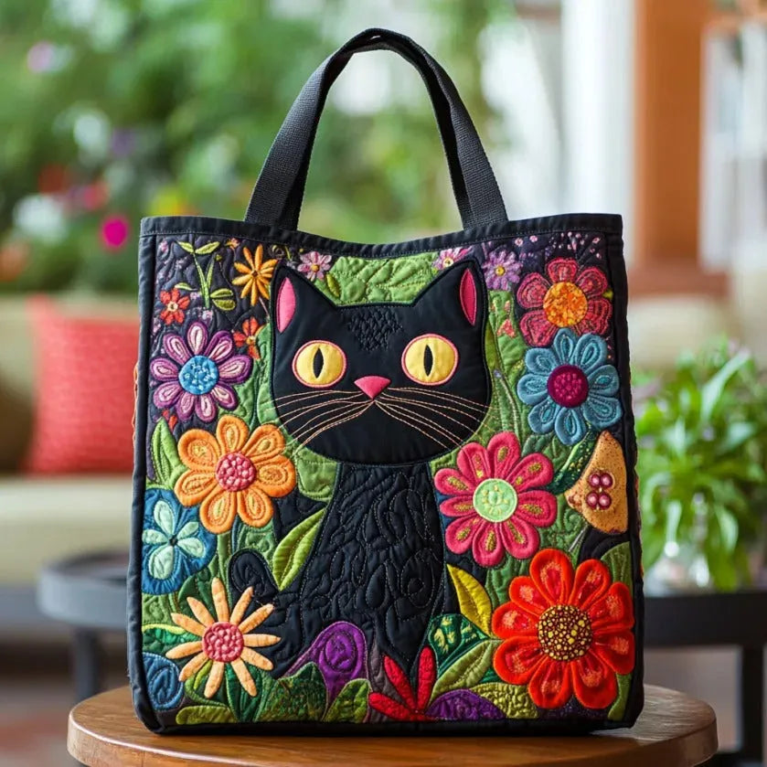 Verzauberte schwarze Katze — handwerklich gesteppte Tasche