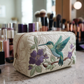 Kolibri in voller Blüte — gesteppte Kosmetiktasche